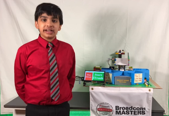 Broadcom Masters决赛选手Abhijeet Ghosh与他的项目合影